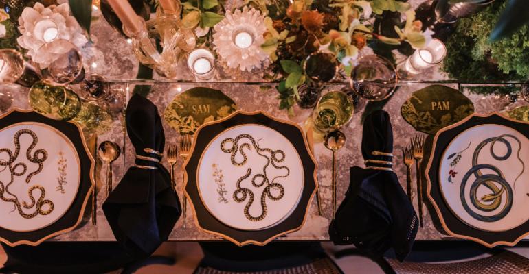 table setting with snake motifs